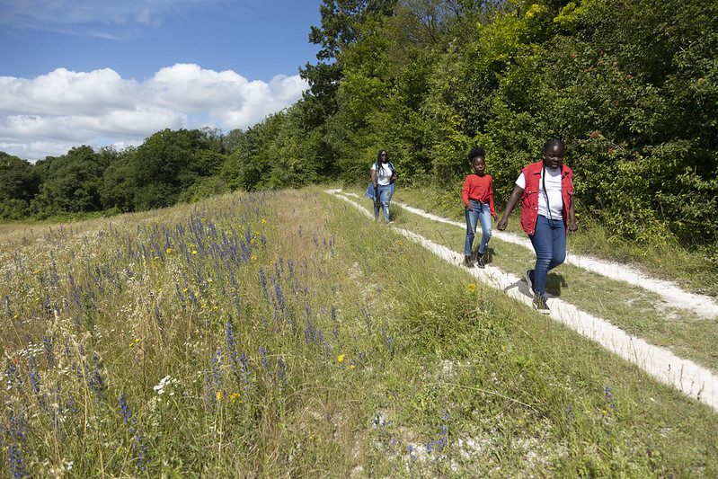 A family enjoy the walking trails at Ranscombe Farm.