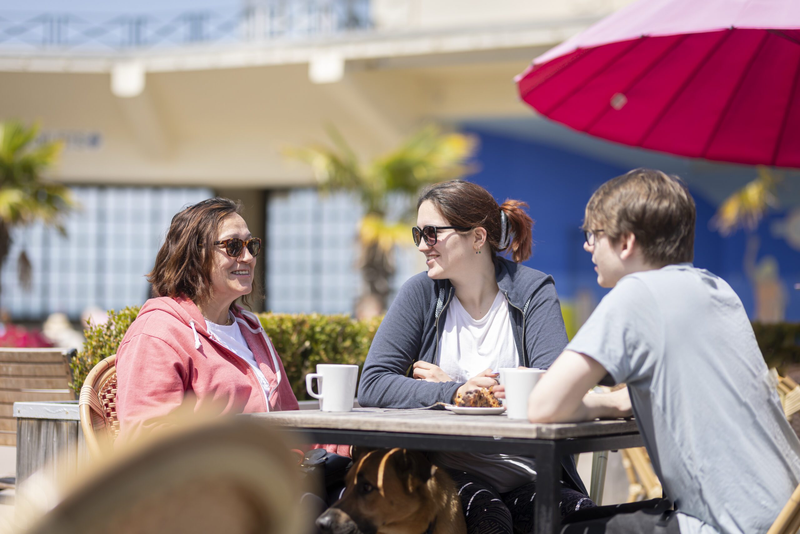 People enjoying coffee on a sunny day in Herne Bay