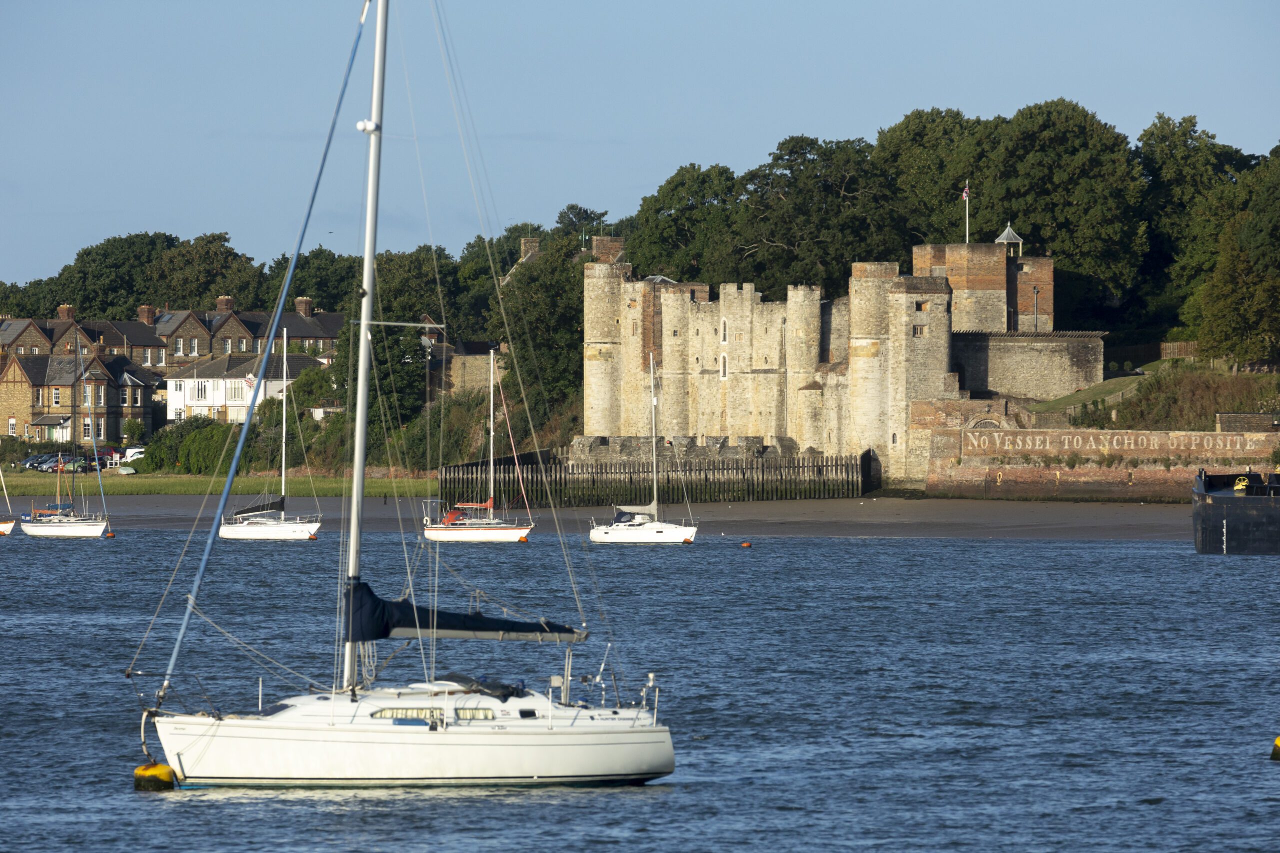 View of Upnor Castle with boats in the foreground.