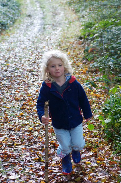 Child with walking stick