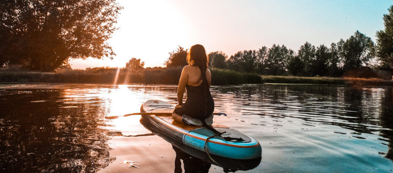 Paddle boarding at sunset in kent