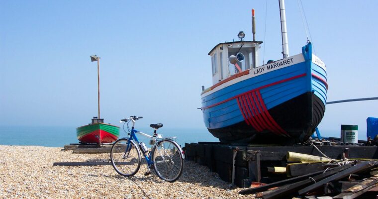 Beach shot of Deal with a fishing boat and bike