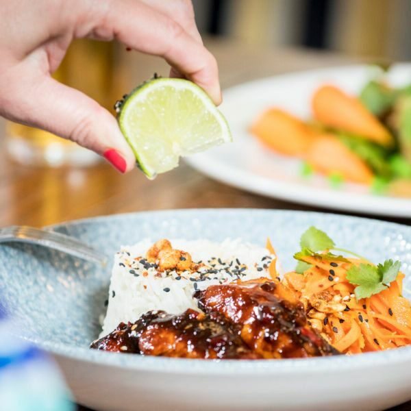 Starter dish with salad and lime.