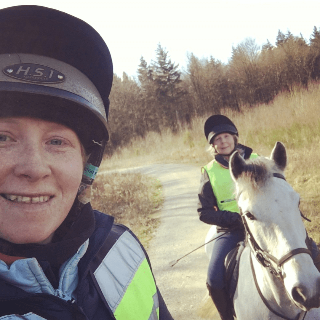 Karley Hubbard and her mum on a horse