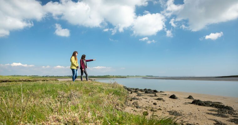 girls overlooking views at oare marshes
