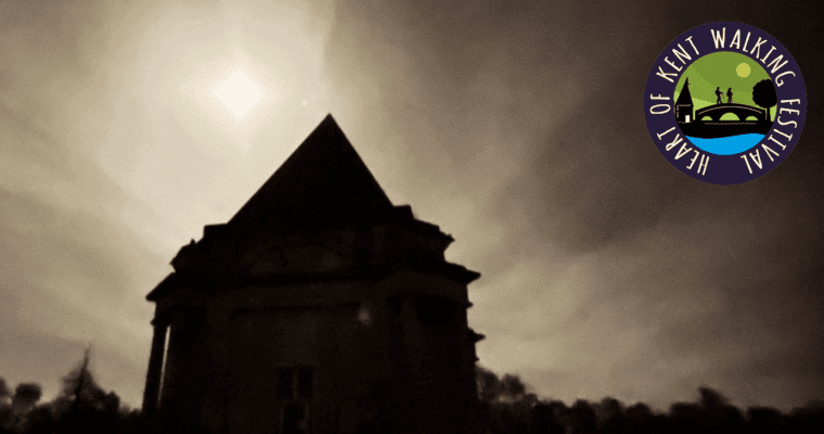 Outline of a building at night with the Heart of Kent Walking Festival logo