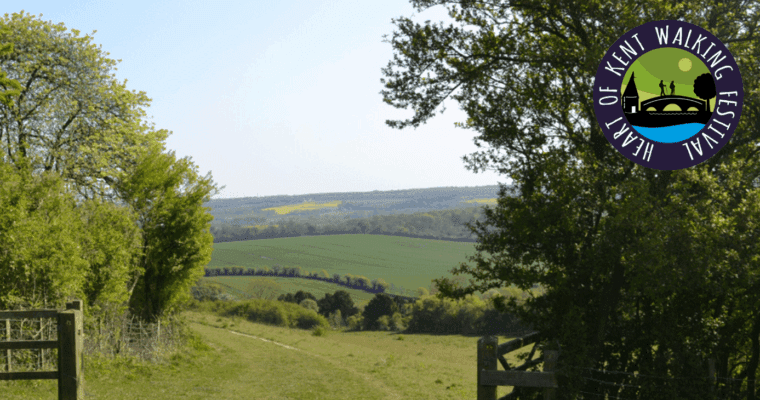 View of the Kent Downs with the Heart of Kent Walking Festival logo