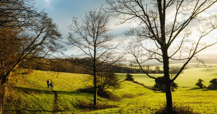 People walking in the Kent Downs near Hollingbourne.