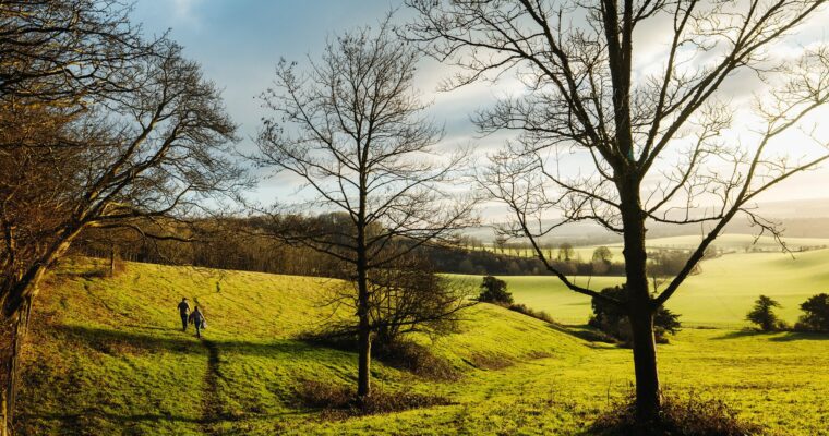 People walking in the Kent Downs near Hollingbourne.