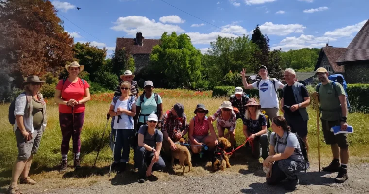 an image of a group of walkers posing in front of a camera