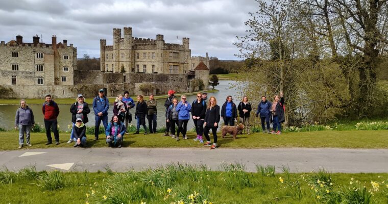 walkers standing in front of Leeds Castle