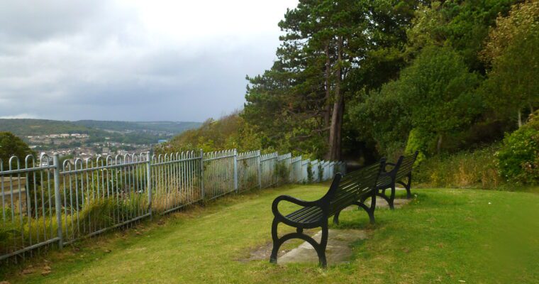 Bench, overlooking a viewpoint of a town